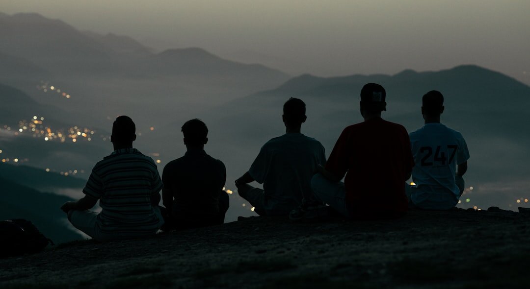 person meditating in nature